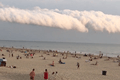 Bijzondere wolk op het strand